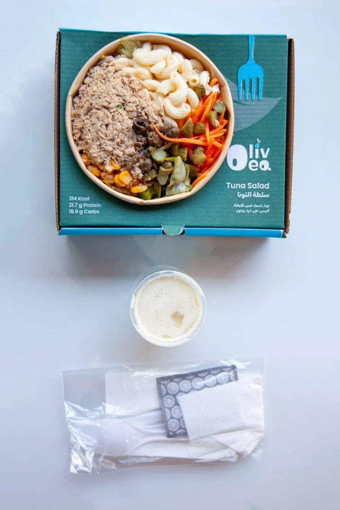 healthy salad meal served with dressing