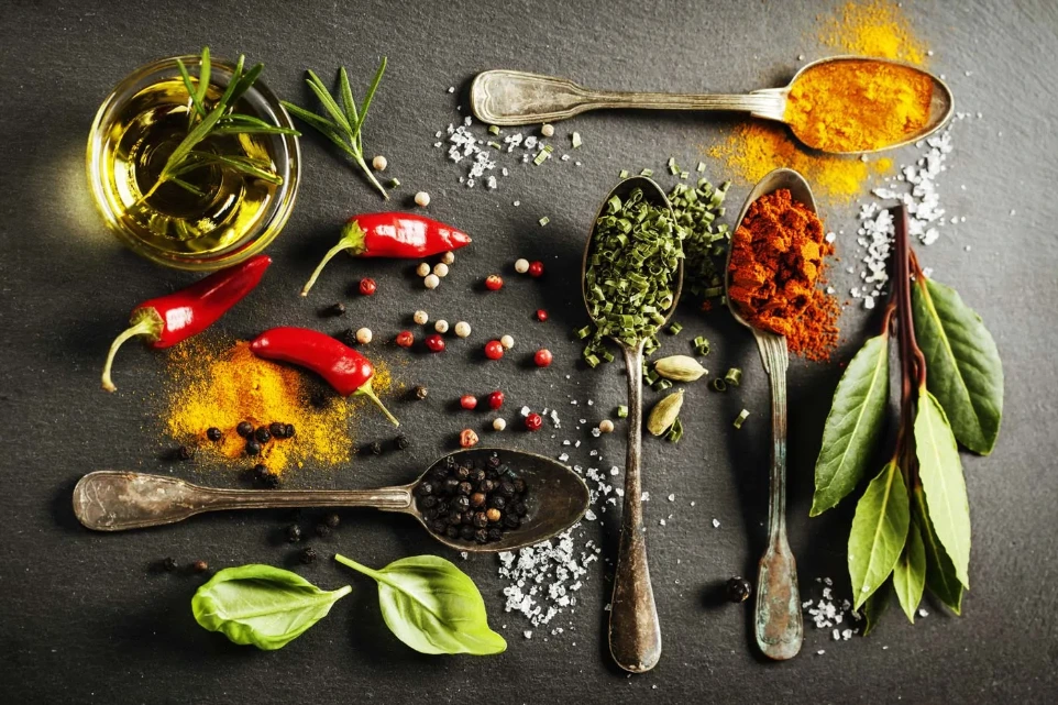 fresh vegetables and spices used in salad preparation